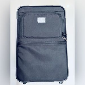 TUMI Carry-On 22” Suitcase.